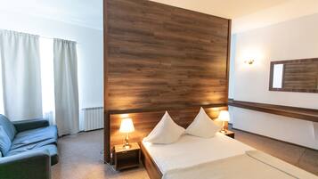 Family Triple Room, Multiple Beds | Individually decorated, individually furnished, desk, laptop workspace