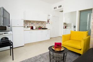 Comfort-Apartment | Wohnbereich | Flachbildfernseher