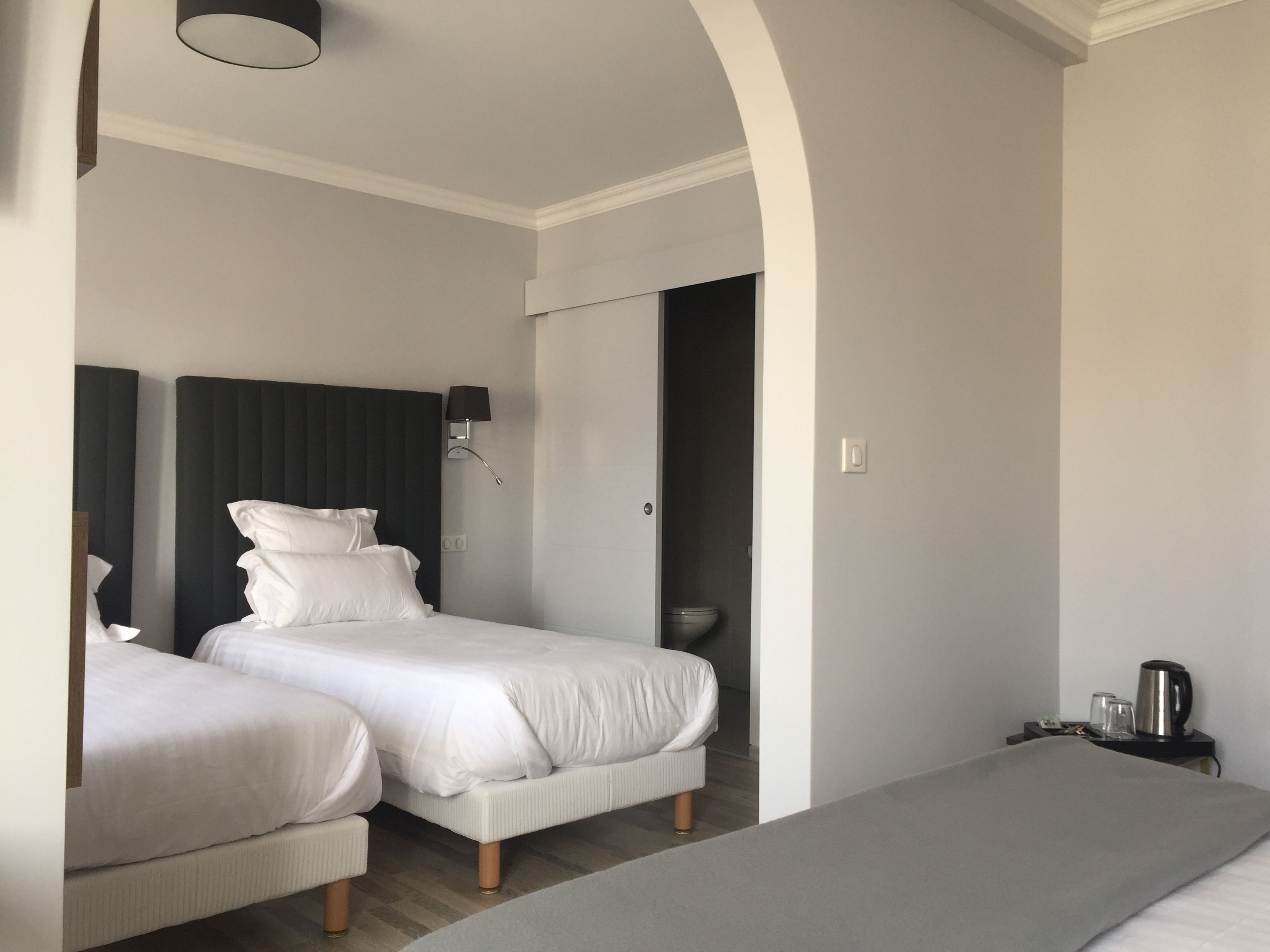 quadruple room | select comfort beds, minibar, individually furnished, iron/ironing board