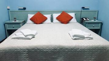 Classic Double Room | Minibar, in-room safe, desk, iron/ironing board