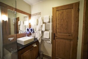 Hair dryer, towels, soap, shampoo
