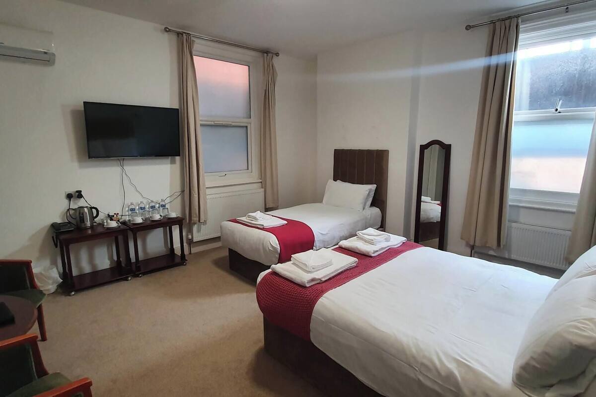 quad family room | 1 bedroom, desk, laptop workspace, iron/ironing board