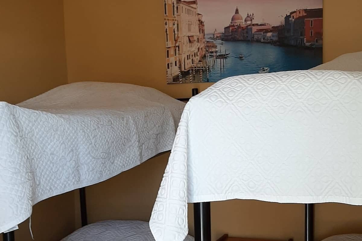 Basic Quadruple Room, Multiple Bedrooms, Courtyard View | Iron/ironing board, free WiFi, bed sheets, wheelchair access