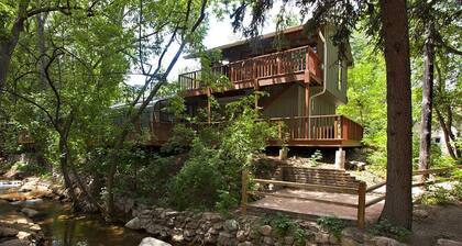 Enchanting Hideaway ON Cheyenne Creek! Five Minute Walk to Broadmoor!