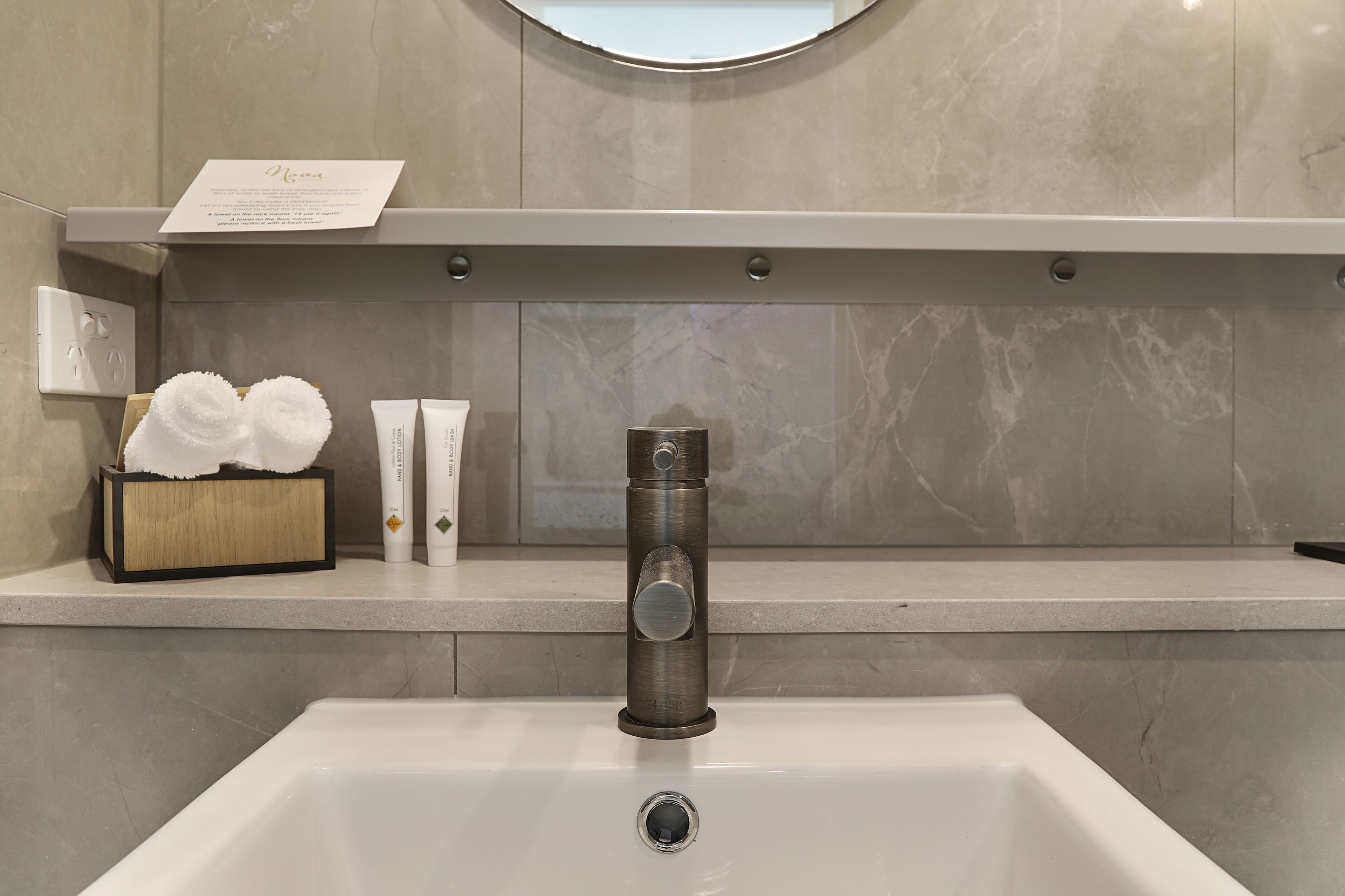 queen room with kitchenette | bathroom | free toiletries, hair dryer, towels