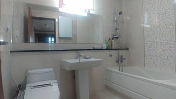 Shower, free toiletries, hair dryer, towels