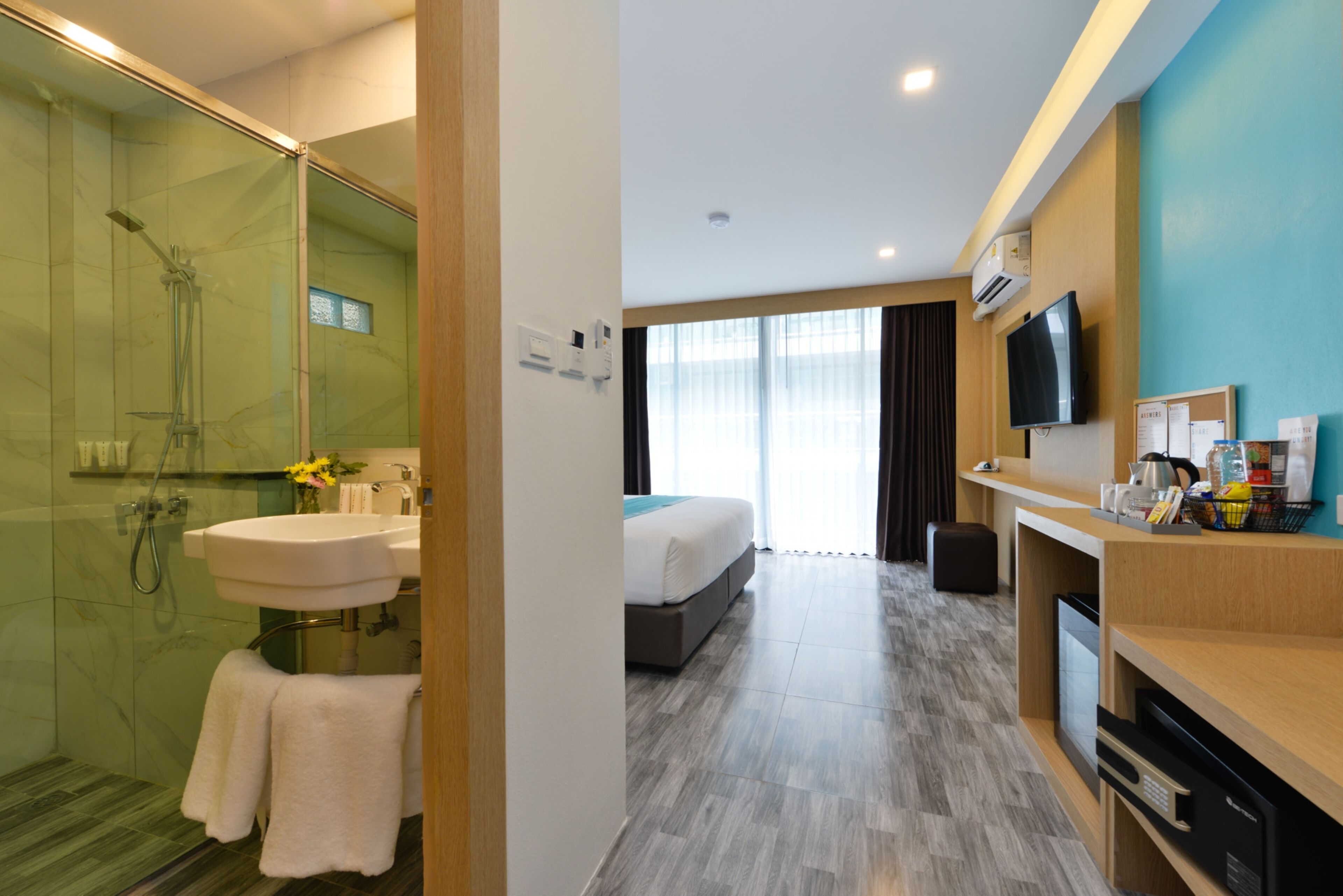 Shower, free toiletries, hair dryer, slippers