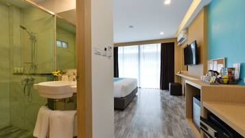 Shower, free toiletries, hair dryer, slippers