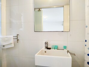 Suite estudio clásica | Lavabo en el baño