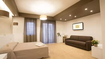 Superior Quadruple Room (2) | Minibar, in-room safe, desk, blackout drapes