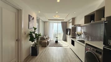 Apartment, 2 Bedrooms, Sea View | Living area | Flat-screen TV