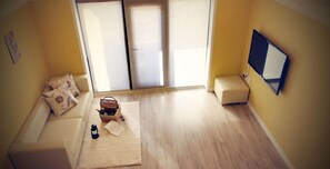 Habitación | Sala de estar | Televisión de pantalla plana 