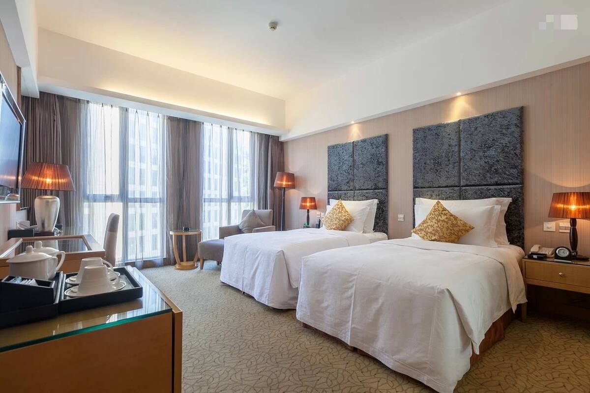 Kamar Twin Deluks | Minibar, meja kerja, tirai kedap cahaya, dan Wi-Fi gratis