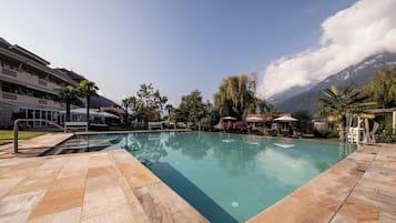 Indoor pool, outdoor pool, open 7:00 AM to 7:00 PM, pool umbrellas