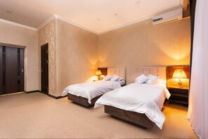 Minibar, desk, laptop workspace, blackout curtains
