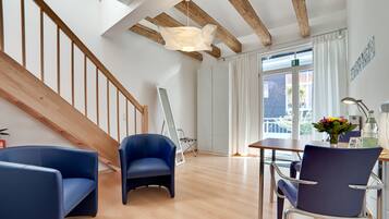 Comfort Double Room | Living area | Flat-screen TV