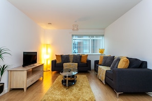 Exclusive-Apartment | Wohnbereich | Flachbildfernseher