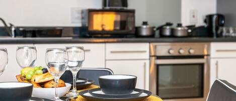 Exclusive Apartment | Private kitchen | Fridge, microwave, stovetop, electric kettle