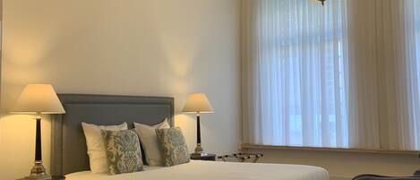 Premium bedding, minibar, desk, laptop workspace