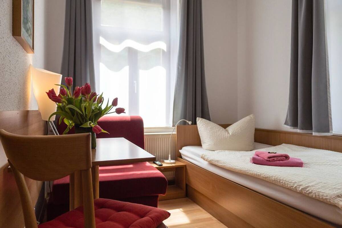 Habitación individual | Minibar, cortinas opacas, cunas gratuitas y wifi gratis
