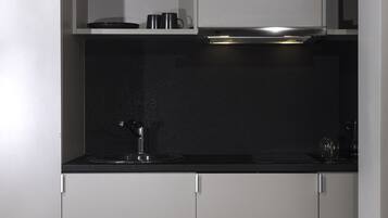 Fridge, stovetop, coffee/tea maker, electric kettle