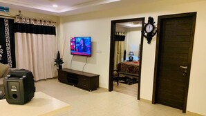 Living area - single bed furnished Apartment Islamabad (Rawalpindi)