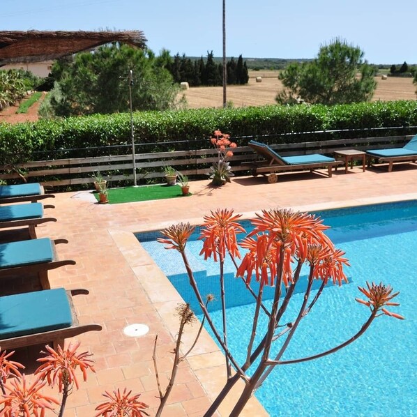 Outdoor pool, pool umbrellas, pool loungers