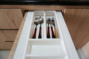 Private kitchen - Best Homey Studio at The Oasis Apartment (Cikarang)