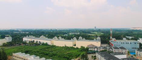 A large building complex with multiple structures, including a prominent dome and a tall tower.