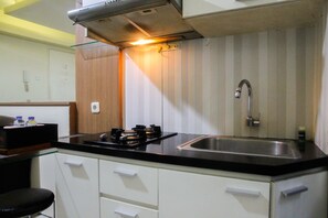 Private kitchen - Simply Minimalist 2BR Apartment at Green Palace Kalibata (Jakarta)