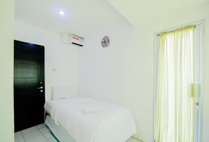 Room | 2 bedrooms, free WiFi, bed sheets - Homey 2BR Apartment at Paragon Village (Curug)