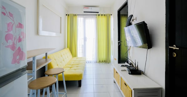 Habitación | Área de sala de estar | Televisión 