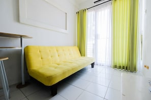 Habitación | Área de sala de estar | Televisión 