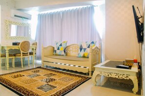 Room | Living area | TV - Luxury Furnished 2BR Grand Kamala Lagoon Apartment (Bekasi)