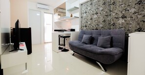 Camera | Area soggiorno | TV