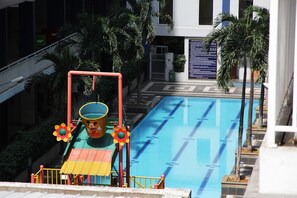 Children’s play area – outdoor - Azalea Suites Cikarang Studio Apartment with Bathtub (Cikarang)