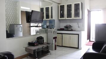 Quarto | Área de estar | TV