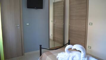 Desk, free WiFi, bed sheets