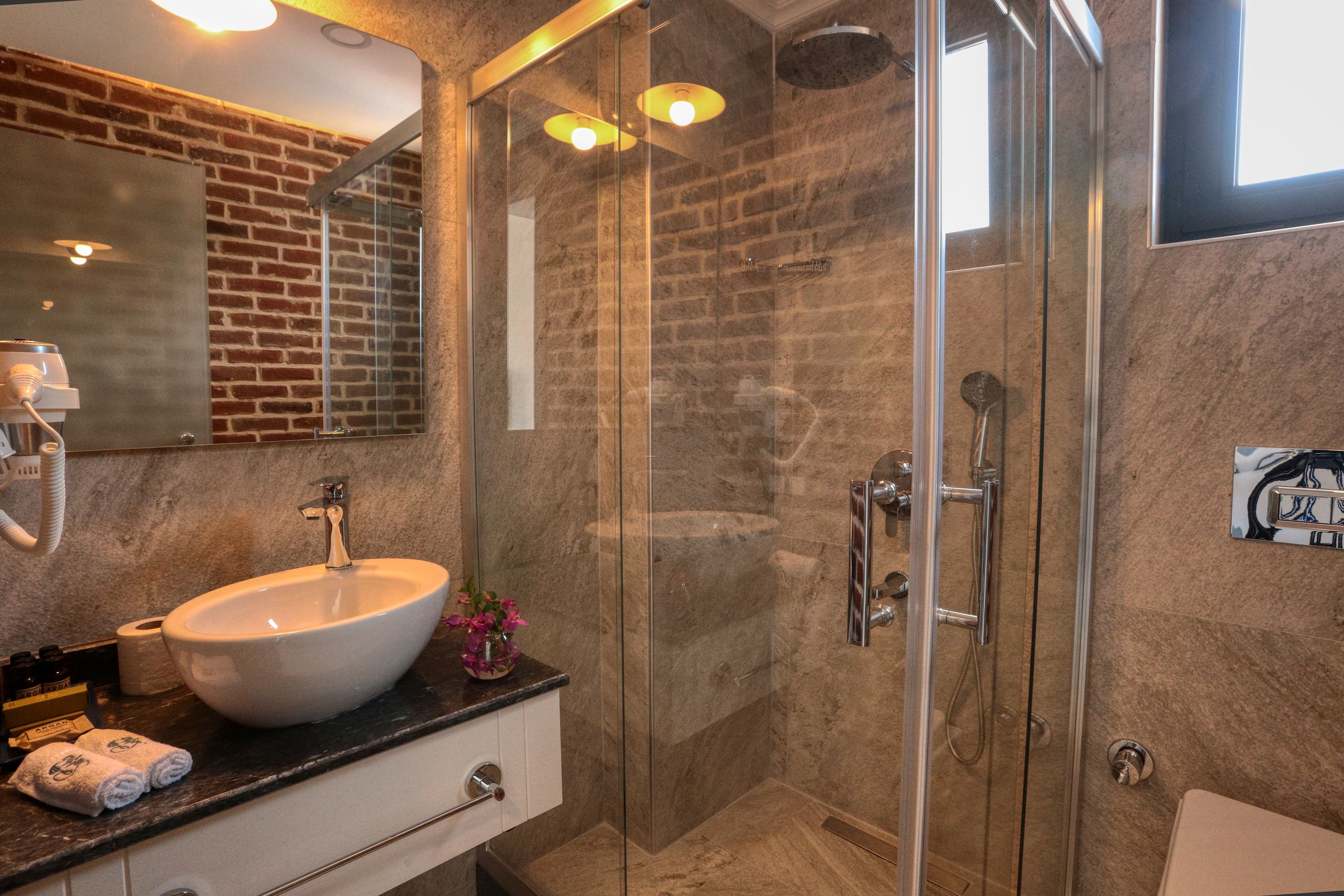 standard double or twin room (olive grove view) | bathroom | shower, free toiletries, hair dryer, slippers