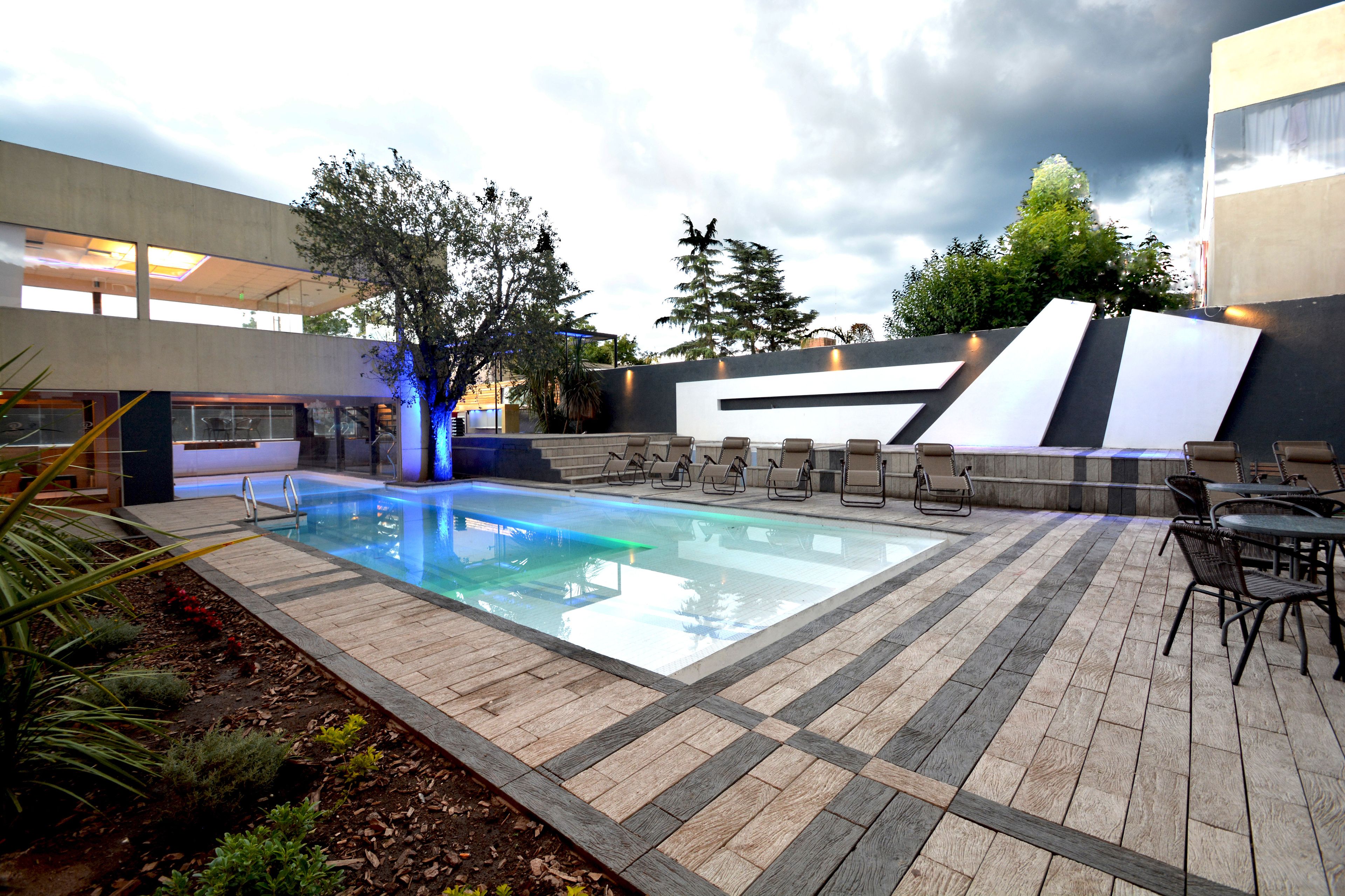 Indoor pool, 2 outdoor pools, open 9:00 AM to 9:00 PM, pool umbrellas