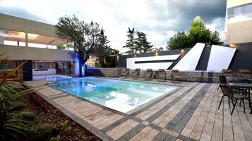 Indoor pool, 2 outdoor pools, open 9:00 AM to 9:00 PM, pool umbrellas