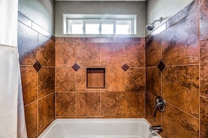 Bathtub, hair dryer, towels
