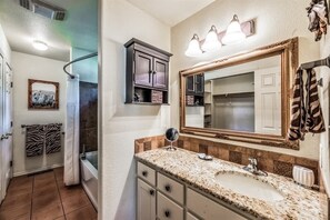 Bathtub, hair dryer, towels