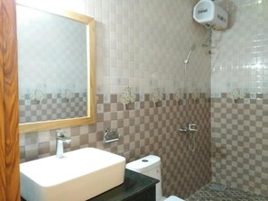 Shower, free toiletries, hair dryer, slippers