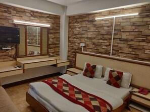 Family Room | Soundproofing, rollaway beds, free WiFi, bed sheets - Hotel Hamers International (Dehradun)