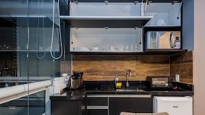 Deluxe Quadruple Room | Private kitchen - Residencial Be Paulista (São Paulo)