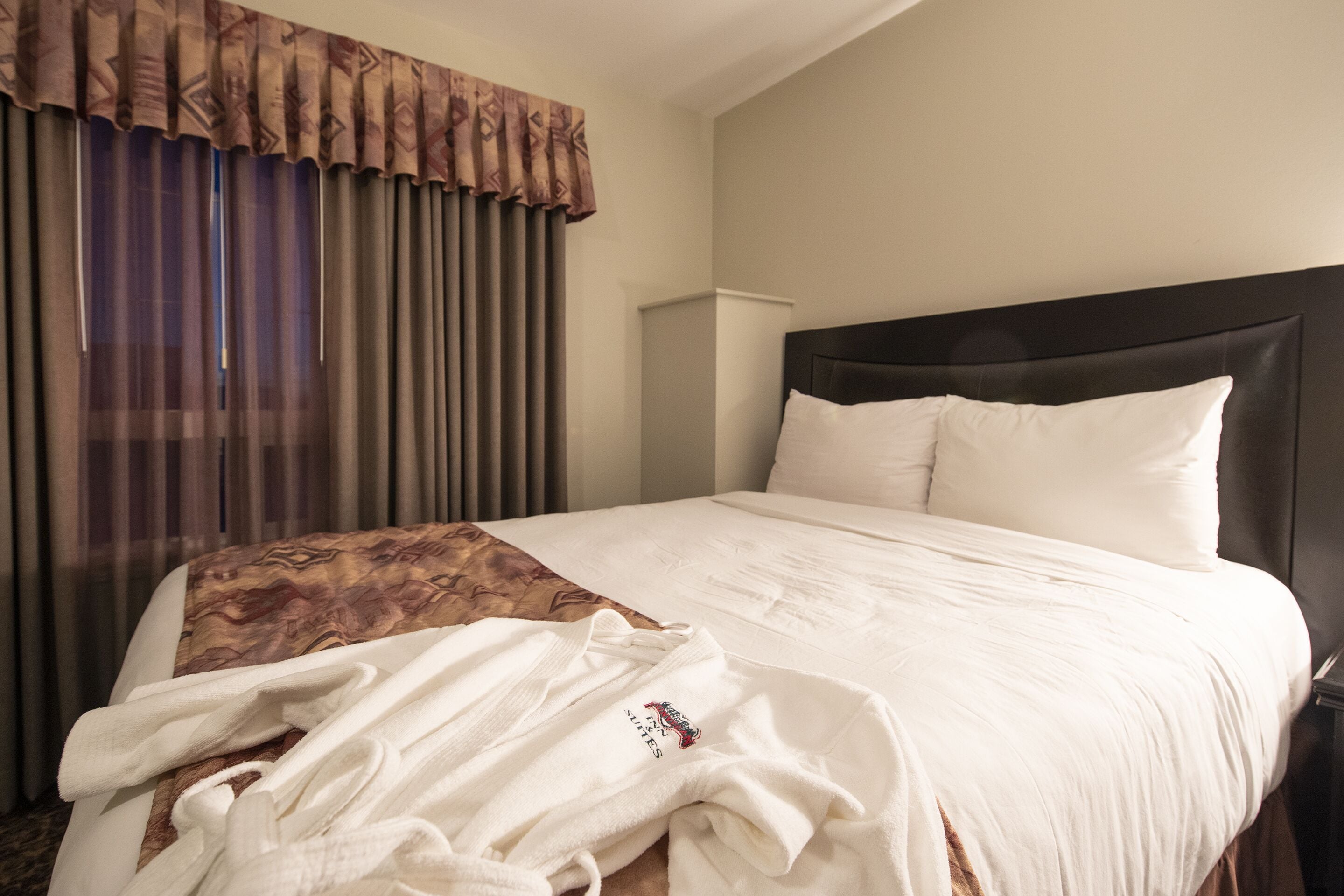 condominium suite | pillow-top beds, desk, laptop workspace, blackout curtains