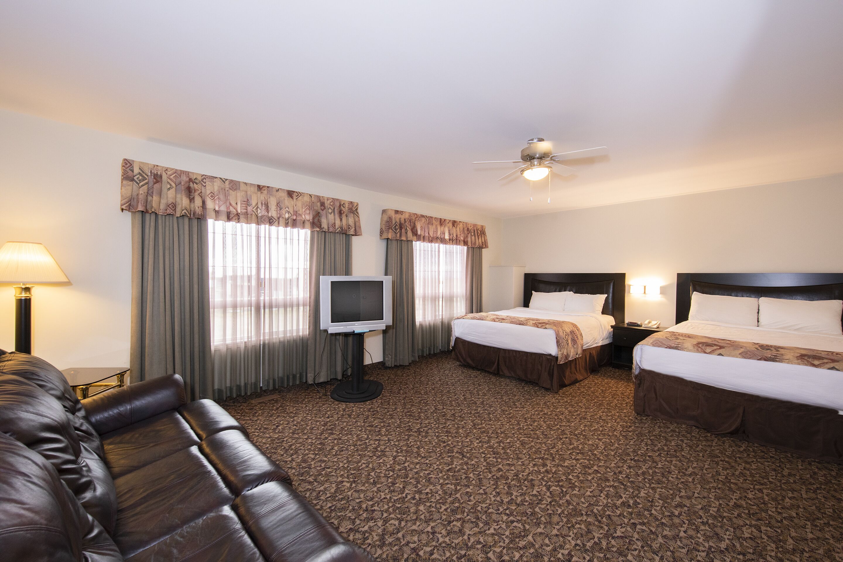 condominium suite | pillow-top beds, desk, laptop workspace, blackout curtains