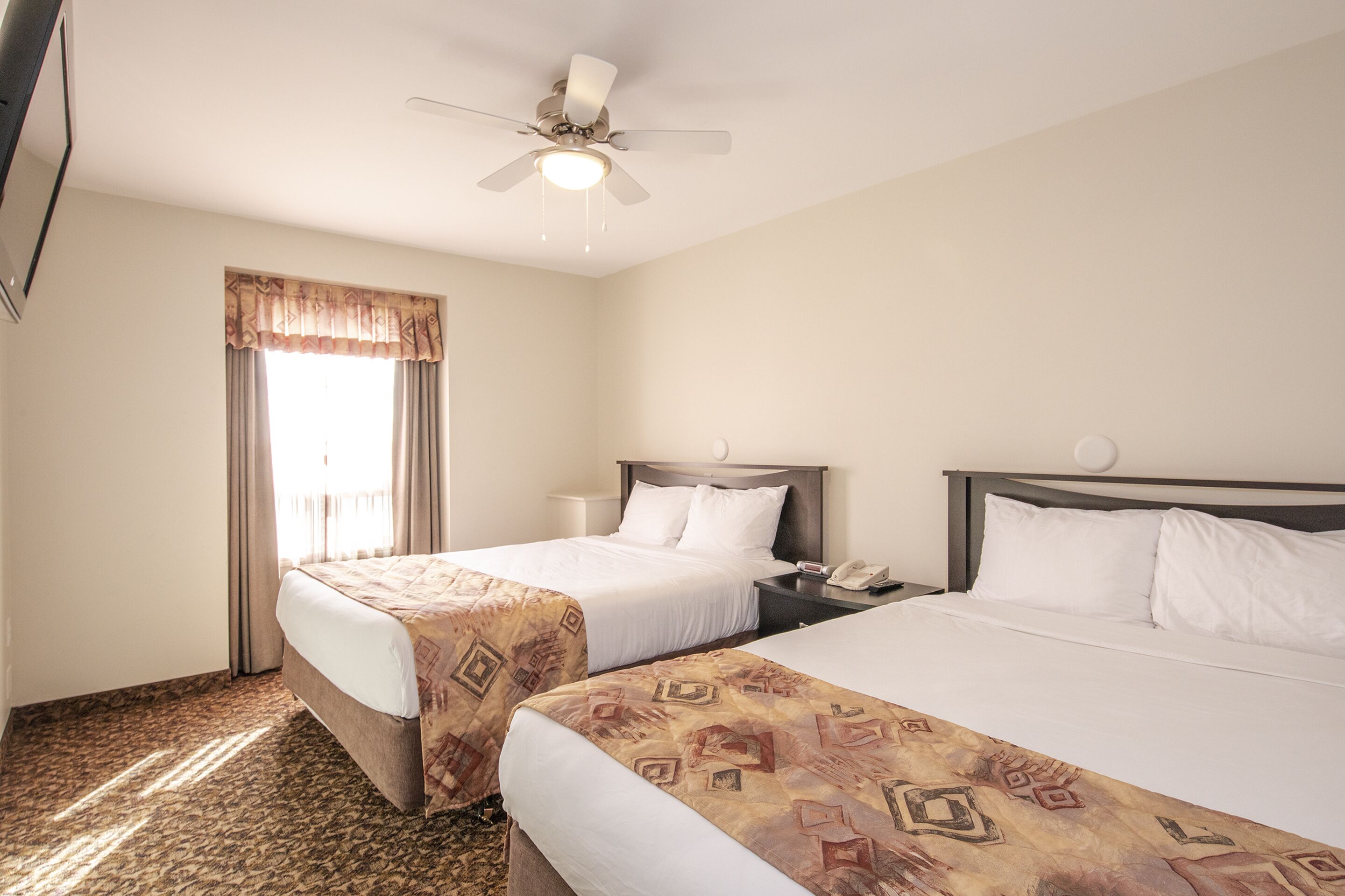 family condominium | pillow-top beds, desk, laptop workspace, blackout curtains