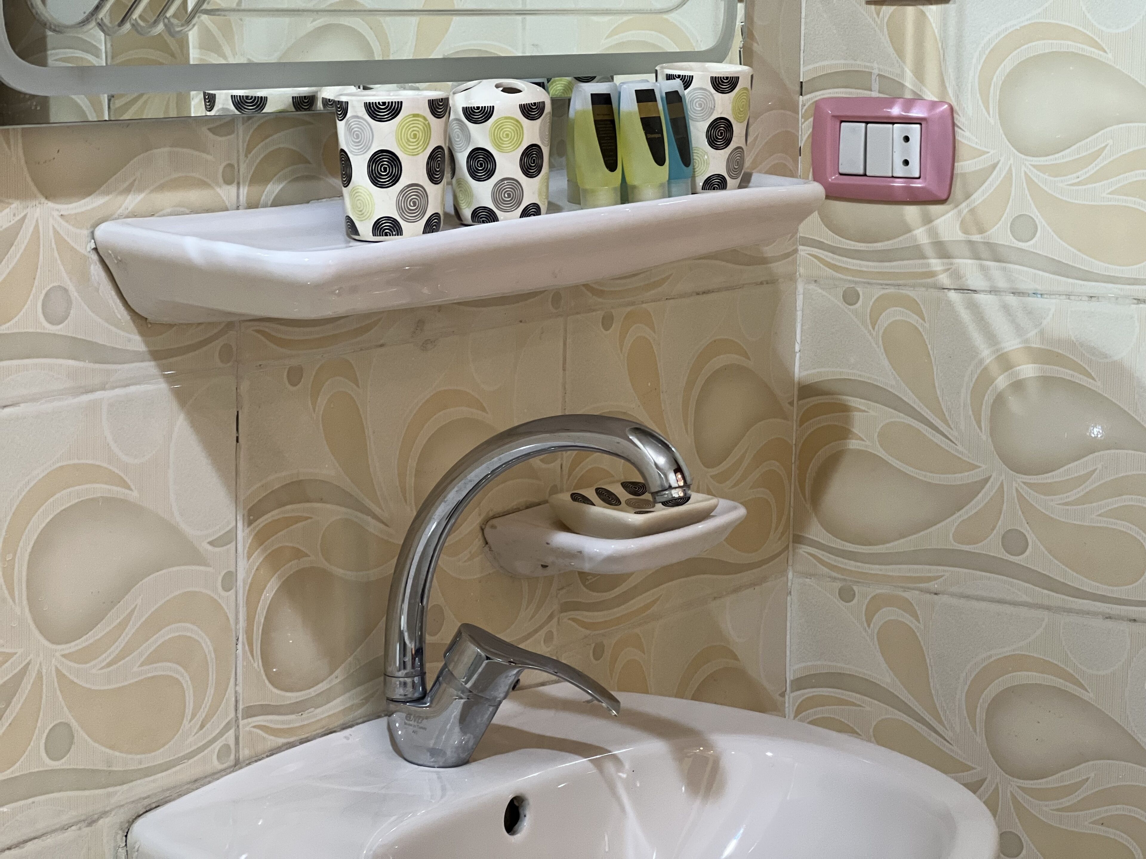 family room | bathroom | rainfall showerhead, slippers, towels, soap